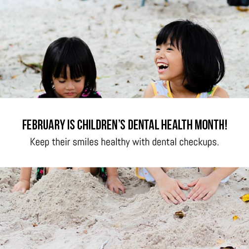 Children playing in the sand for children's dental health month